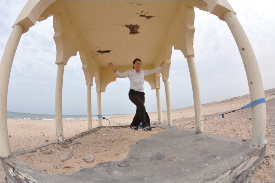 a slack-session on asilah beach in al ashkaran